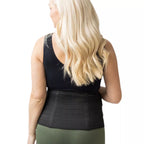 Mom-to-be wearing black maternity back support belt, rear view showing full back pain relief on a white background.