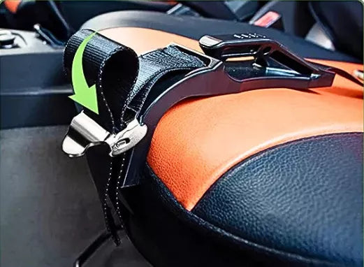 Step 4 of installing a pregnancy seat belt adjuster — secure the hook clip to keep the lap belt safely under the belly.