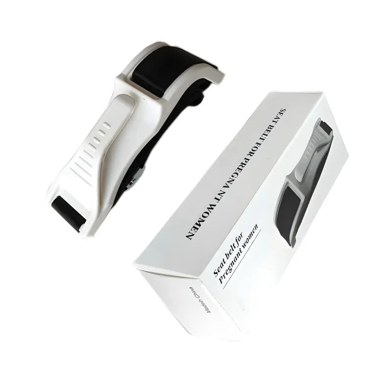 White tummy shield car lap belt extender for expecting mothers, shown with product box on a clean background.